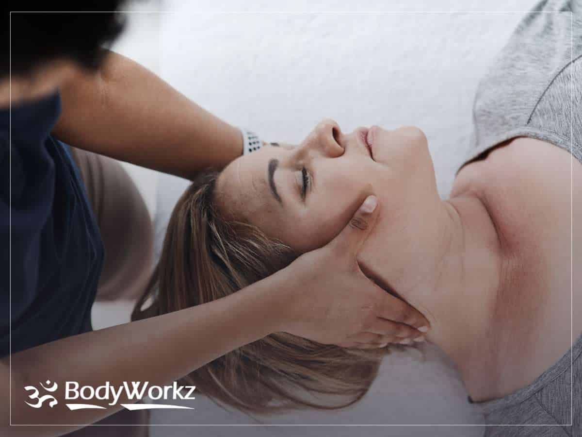 Chiropractic Care session in progress with a Mesa chiropractor helping a patient relieve neck tension